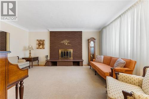 595 Elizabeth Street, Pembroke, ON - Indoor Photo Showing Living Room With Fireplace