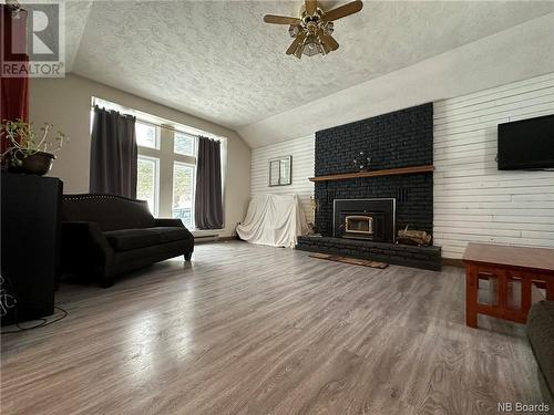 2771 Hwy 420, Matthews Settlement, NB - Indoor Photo Showing Living Room With Fireplace