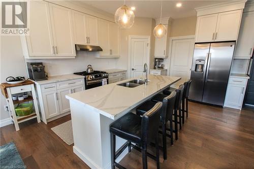 23 Carriage Crossing, Drayton, ON - Indoor Photo Showing Kitchen With Double Sink With Upgraded Kitchen