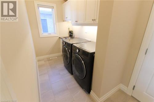 23 Carriage Crossing, Drayton, ON - Indoor Photo Showing Laundry Room