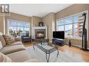 1125 Bernard Avenue Unit# 406, Kelowna, BC  - Indoor Photo Showing Living Room With Fireplace 