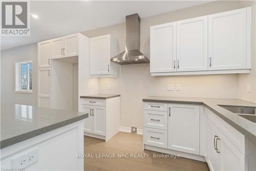 735 Dominion Rd, Fort Erie, ON - Indoor Photo Showing Kitchen With Double Sink