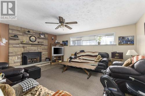 100 Pleasant Dr, Sault Ste. Marie, ON - Indoor Photo Showing Living Room With Fireplace