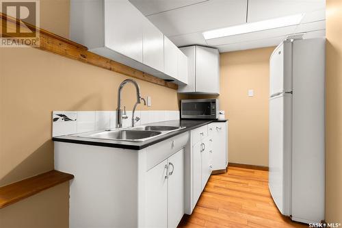 147 Pasqua Street, Regina, SK - Indoor Photo Showing Kitchen With Double Sink