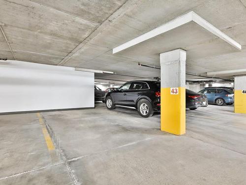 Parking - 208-3950 Rue Claude-Henri-Grignon, Montréal (Saint-Laurent), QC - Indoor Photo Showing Garage