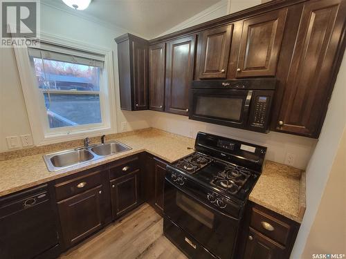 603 Pacific Avenue, Kerrobert, SK - Indoor Photo Showing Kitchen With Double Sink