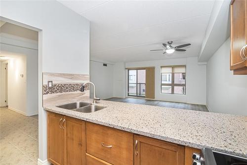 56 Kerman Avenue|Unit #109, Grimsby, ON - Indoor Photo Showing Kitchen With Double Sink