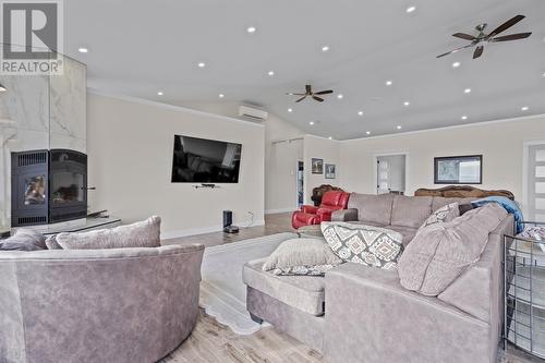 0 Bauline East Road, Tors Cove, NL - Indoor Photo Showing Living Room With Fireplace