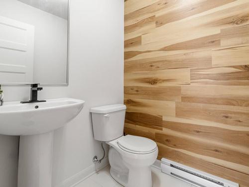 Powder room - 24 34E Avenue, Bois-Des-Filion, QC - Indoor Photo Showing Bathroom