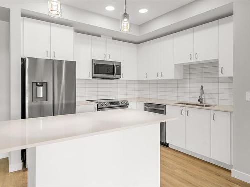 309-120 Jensen Ave West, Parksville, BC - Indoor Photo Showing Kitchen With Upgraded Kitchen