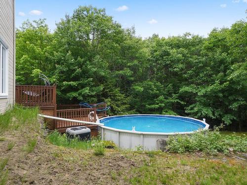 Piscine - 115 Rue De La Cime, Saint-Colomban, QC - Outdoor With Above Ground Pool With Backyard