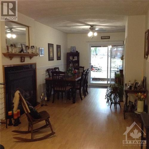 13 Bayview Crescent, Smiths Falls, ON - Indoor Photo Showing Dining Room With Fireplace