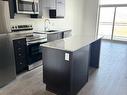 620-460 Gordon Krantz Ave, Milton, ON  - Indoor Photo Showing Kitchen With Stainless Steel Kitchen With Upgraded Kitchen 