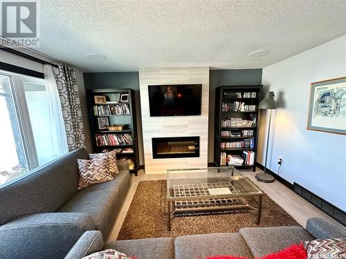 271 22Nd Street, Battleford, SK - Indoor Photo Showing Living Room With Fireplace