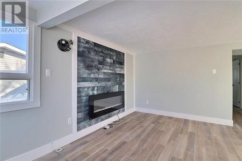 5 Cajun, Grand-Barachois, NB - Indoor Photo Showing Other Room With Fireplace