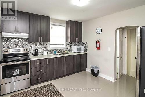 6197 Culp St, Niagara Falls, ON - Indoor Photo Showing Kitchen With Double Sink