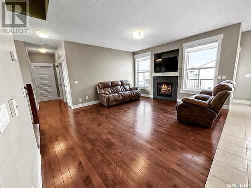133 Valley Park Place, Swift Current, SK - Indoor Photo Showing Living Room With Fireplace