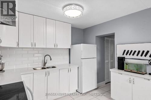 #226 -580 Mary St E, Whitby, ON - Indoor Photo Showing Kitchen With Double Sink