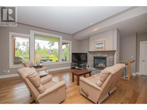 427 Longspoon Drive, Vernon, BC - Indoor Photo Showing Living Room With Fireplace