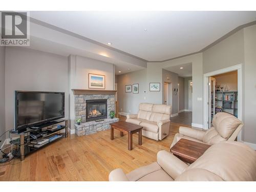 427 Longspoon Drive, Vernon, BC - Indoor Photo Showing Living Room With Fireplace
