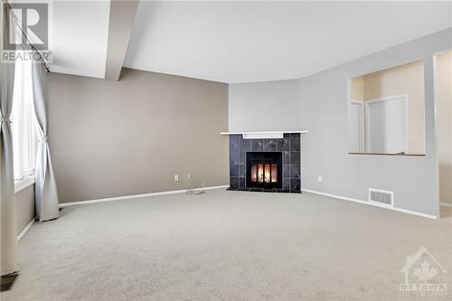 201-A Woodfield Drive, Ottawa, ON - Indoor With Fireplace