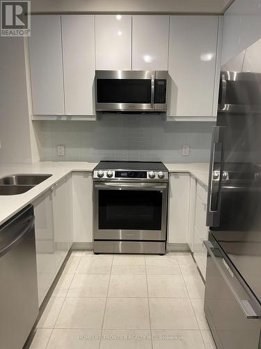 208 - 50 Thomas Riley Road, Toronto, ON - Indoor Photo Showing Kitchen With Double Sink