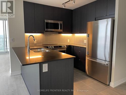 #1003 -50 Thomas Riley Rd, Toronto, ON - Indoor Photo Showing Kitchen With Double Sink With Upgraded Kitchen
