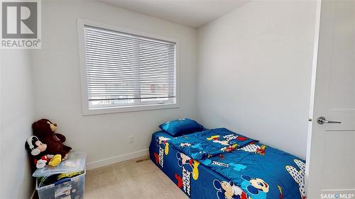 5672 Prefontaine Avenue, Regina, SK - Indoor Photo Showing Bedroom