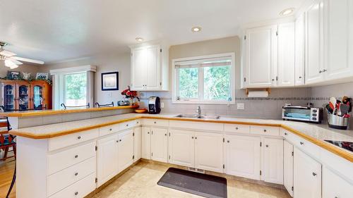 7333 George Road, Jaffray, BC - Indoor Photo Showing Kitchen With Double Sink