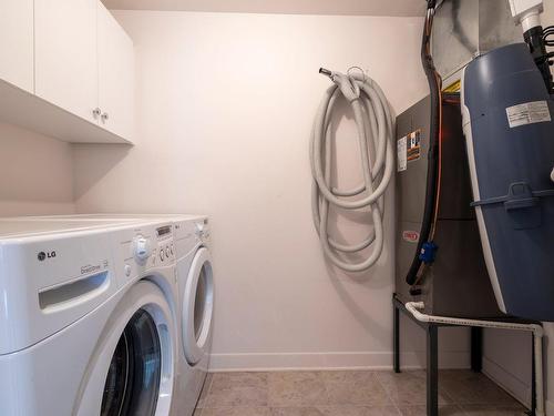 Laundry room - 901-3330 Boul. Le Carrefour, Laval (Chomedey), QC - Indoor Photo Showing Laundry Room