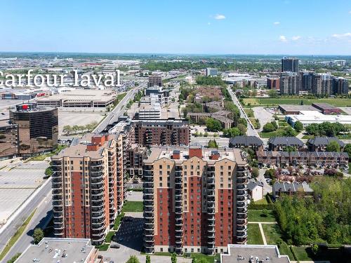 Overall view - 901-3330 Boul. Le Carrefour, Laval (Chomedey), QC - Outdoor With Facade