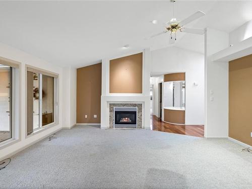 802 Windward Pl, Qualicum Beach, BC - Indoor Photo Showing Other Room With Fireplace