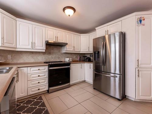 Kitchen - 12011 57E Avenue (R.-D.-P.), Montréal (Rivière-Des-Prairies/Pointe-Aux-Trembles), QC - Indoor Photo Showing Kitchen With Double Sink