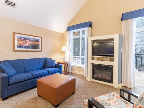 377-13011 Lakeshore Drive, Summerland, BC - Indoor Photo Showing Living Room With Fireplace