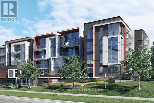 #415 -3028 Creekshore Common, Oakville, ON - Outdoor With Balcony With Facade