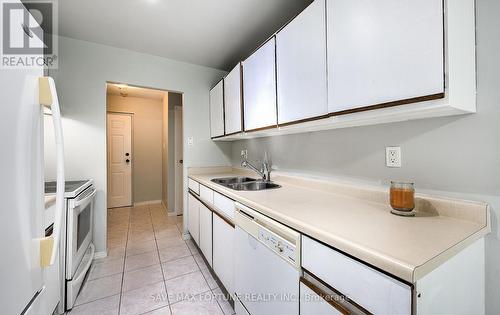 #101 -135 Baseline Rd W, London, ON - Indoor Photo Showing Kitchen With Double Sink