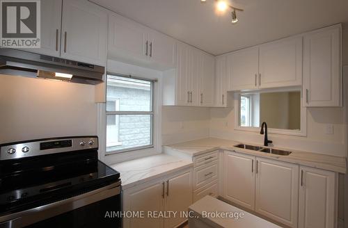 210 Lake St, St. Catharines, ON - Indoor Photo Showing Kitchen With Double Sink