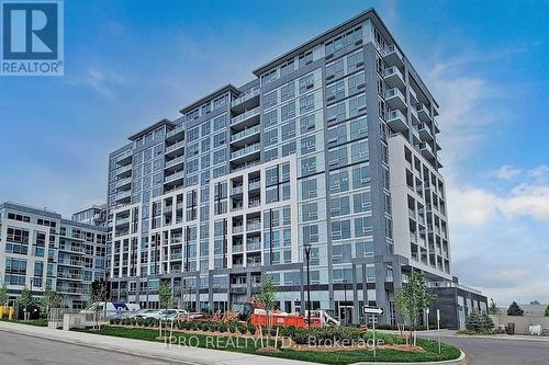 1212 - 1050 Main Street, Milton, ON - Outdoor With Balcony With Facade