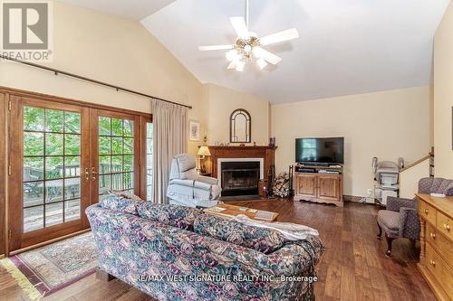 12510 Highway 27, King, ON - Indoor Photo Showing Living Room With Fireplace