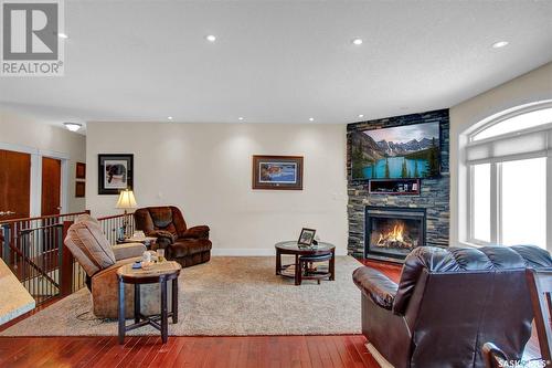 30 Hanley Crescent, Edenwold Rm No. 158, SK - Indoor Photo Showing Living Room With Fireplace