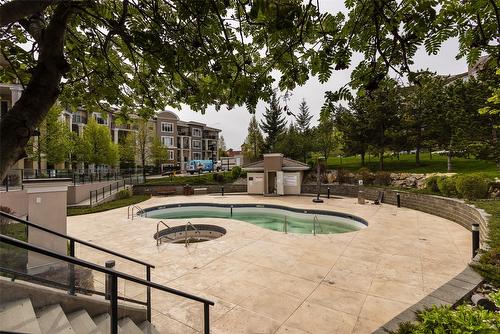 1105-3168 Via Centrale Road, Kelowna, BC - Outdoor With In Ground Pool With Backyard