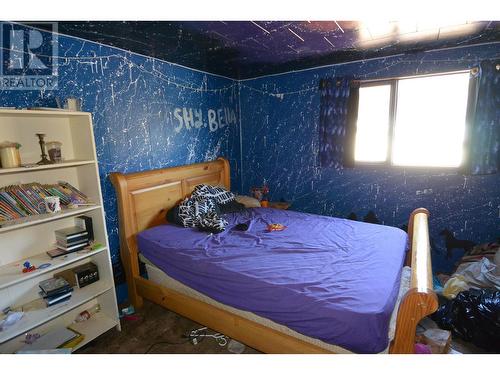7919 Seinen Road, Houston, BC - Indoor Photo Showing Bedroom