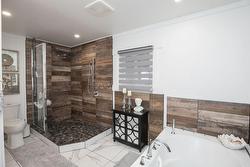 Separate shower in main spa like bathroom - 