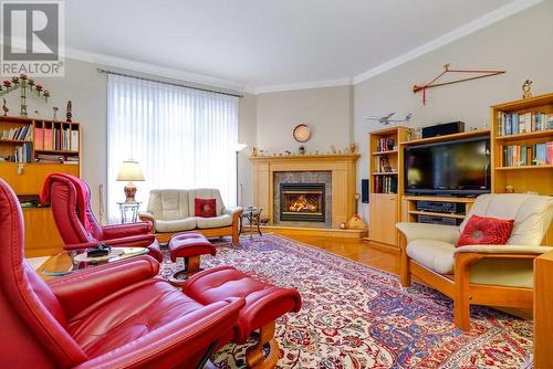 6802 Riverview Drive, Cornwall, ON - Indoor Photo Showing Living Room With Fireplace
