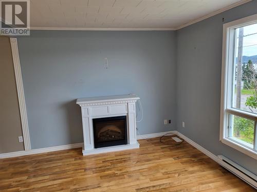 48 Main Road, Queens Cove, NL - Indoor With Fireplace