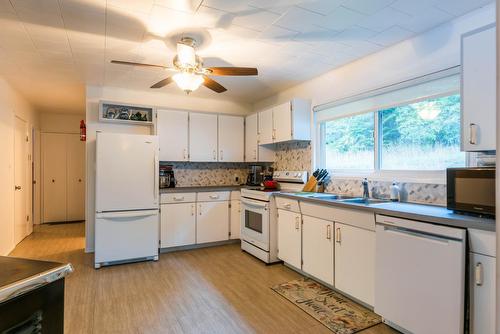 1110 Highway 22, Rossland, BC - Indoor Photo Showing Kitchen With Double Sink