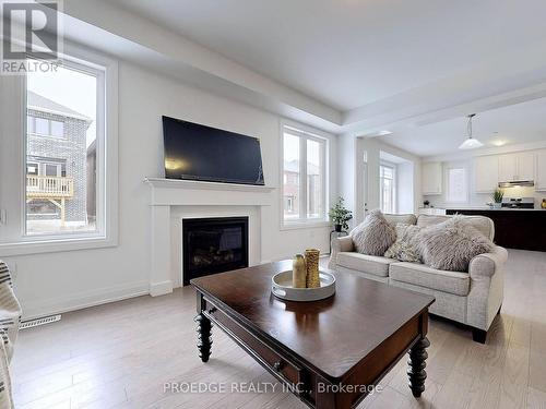 2856 Foxden Sq, Pickering, ON - Indoor Photo Showing Living Room With Fireplace