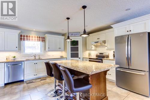 98 Regency Drive, Minto, ON - Indoor Photo Showing Kitchen With Upgraded Kitchen