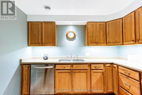 98 Regency Drive, Minto, ON - Indoor Photo Showing Kitchen With Double Sink
