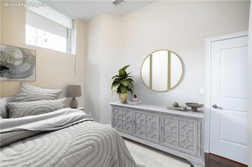 Virtually Staged Photo - 50 Murray Street W|Unit #103, Hamilton, ON - Indoor Photo Showing Bedroom